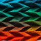 A close up of Shifting Chevrons showing how the shadows fall. Colours are navy, emerald, forest, lime, rust, brown, orange