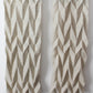 a close up view of the Ups and Downs scarf on a white background
