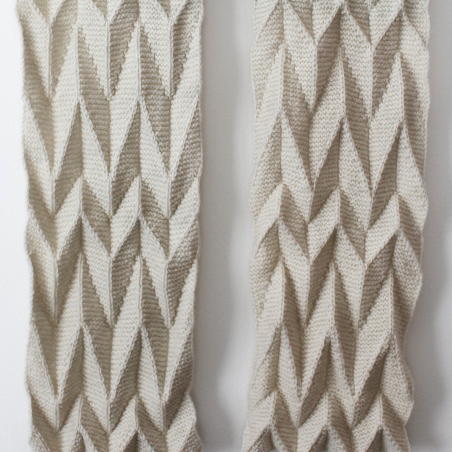 a close up view of the Ups and Downs scarf on a white background